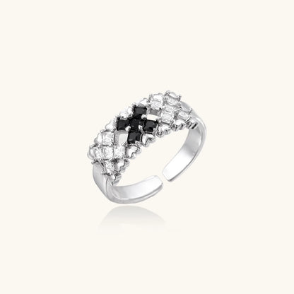 White gold plated adjustable ring with three rows of square zirconia stones in black or pink chevron pattern